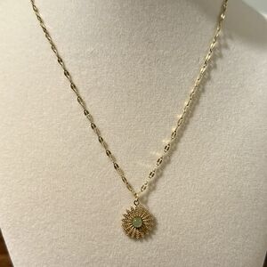 Elegant Gold Sunburst Pendant Necklace